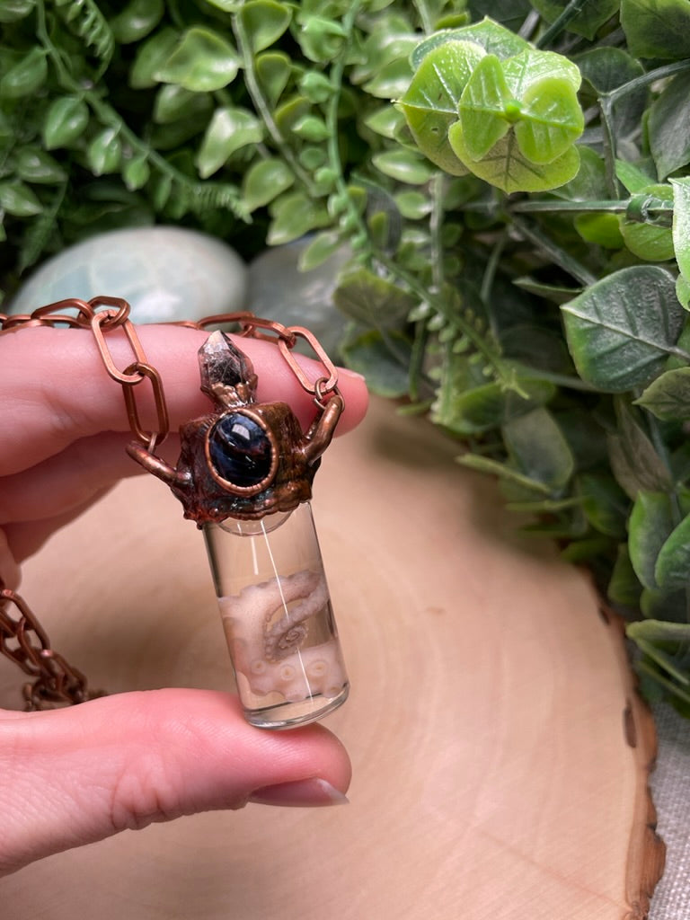 Peterisite, Herkimer Diamond, and Wet Specimen Octopus Leg in a Glass Vial Necklace