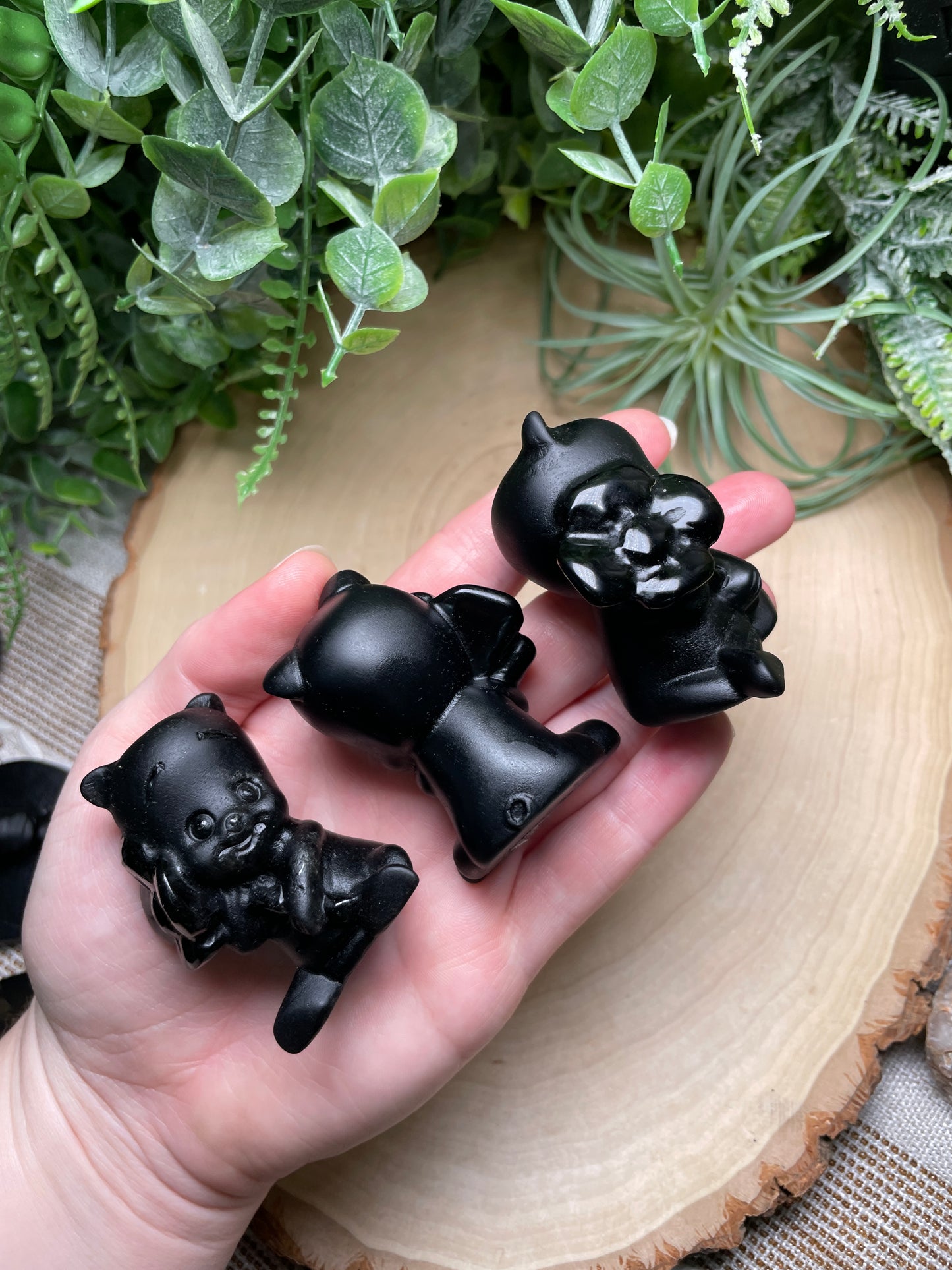 Obsidian Piglet with a Flower